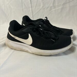 Black and white Nike tennis shoes.